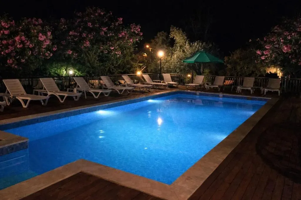 Private balcony with scenic nature and pool views